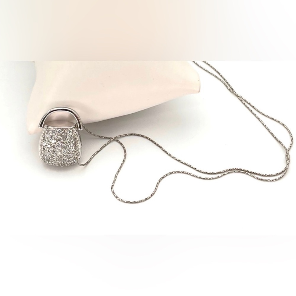 Sterling silver necklace with rhinestone purse pendant